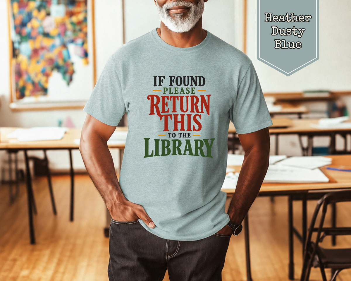 Woman wearing Heather Sand Dune If Found Please Return to the Library t-shirt.