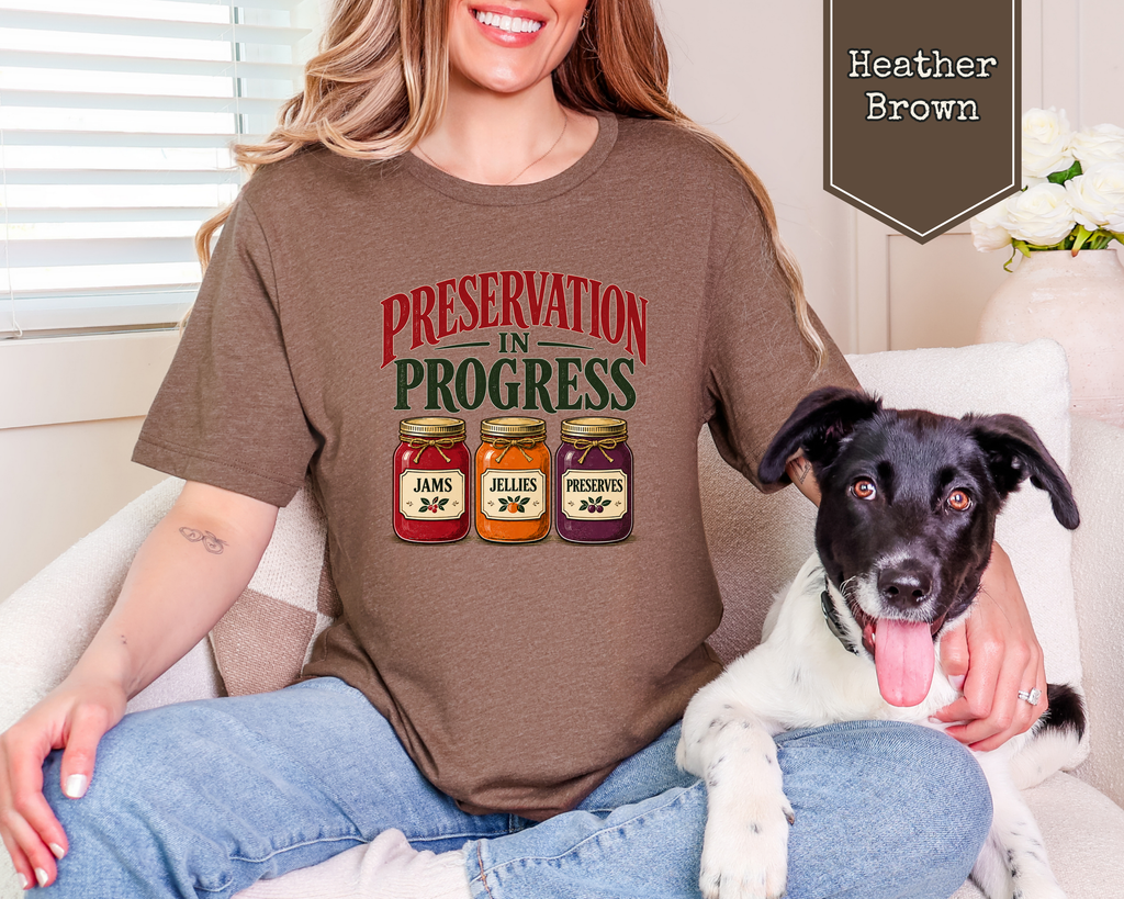 Woman wearing Heather Brown vintage archivist preservation graphic tee.