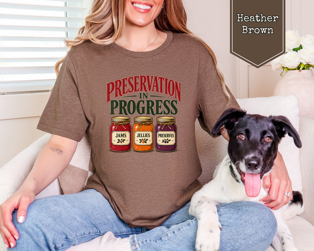 Woman wearing Heather Brown vintage archivist preservation graphic tee.