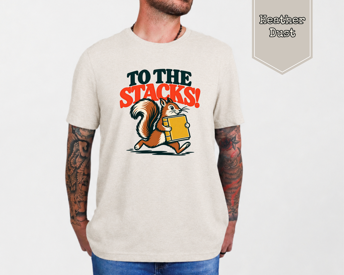 Heather Dust graphic tee with cute retro squirrel carrying a book reading To The Stacks.
